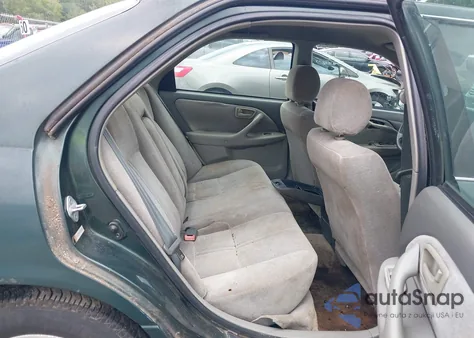 1999 Toyota Camry Le from USA, damaged, VIN 4T1BG22K5XU891030